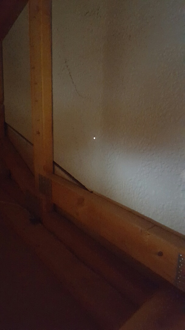 Apache Junction, AZ - Hole in sidding Apache Junction, AZ - Hole in sidding