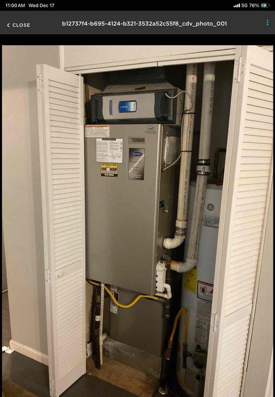 Performed HVAC system replacement consultation for a non-operational system. Inspected existing Carrier furnace/air handler with associated ductwork, gas line connections, and ventilation pipes. Evaluated current Carrier Infinity thermostat functionality, noting system was set to heat pump mode. Client was present during assessment and confirmed desire for complete system replacement.