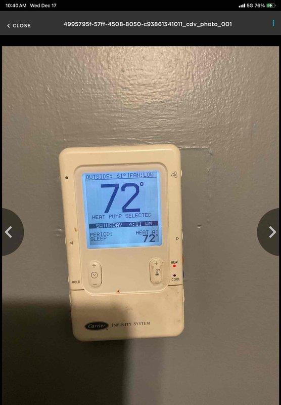 Performed HVAC system replacement consultation for a non-operational system. Inspected existing Carrier furnace/air handler with associated ductwork, gas line connections, and ventilation pipes. Evaluated current Carrier Infinity thermostat functionality, noting system was set to heat pump mode. Client was present during assessment and confirmed desire for complete system replacement.