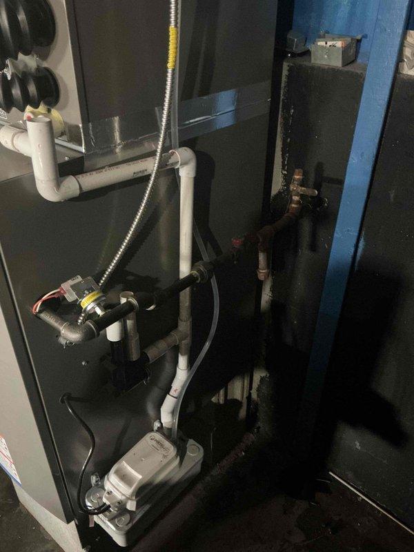 Performed annual planned maintenance on HVAC system installed 6/13/25. Inspected indoor air handler with P-trap drainage configuration and outdoor condensing unit mounted on concrete block base. Checked and confirmed proper operation of condensate drainage system including PVC piping and connections. System has 16x25x5 filter size; customer not renewing maintenance agreement at this time.