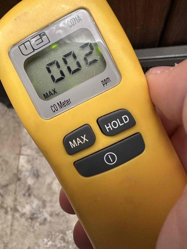 Responded to carbon monoxide alarm activation in recently purchased home with 15-20 year old HVAC system. Conducted comprehensive CO testing using UEI CO meter, detecting elevated levels (32 ppm) at HVAC register. After thorough system inspection and ventilation, CO levels decreased to safe readings (2 ppm). Identified and repaired furnace ventilation leak causing carbon monoxide intrusion.