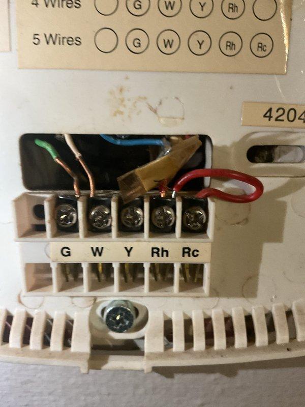 Performed comprehensive assessment for complete HVAC replacement. Inspected existing non-operational furnace and AC system, evaluated ductwork which appears suitable for reuse. Examined thermostat wiring configuration (G, W, Y, Rh, Rc terminals) to ensure compatibility with new system. Customer is interested in financing options and expedited installation.