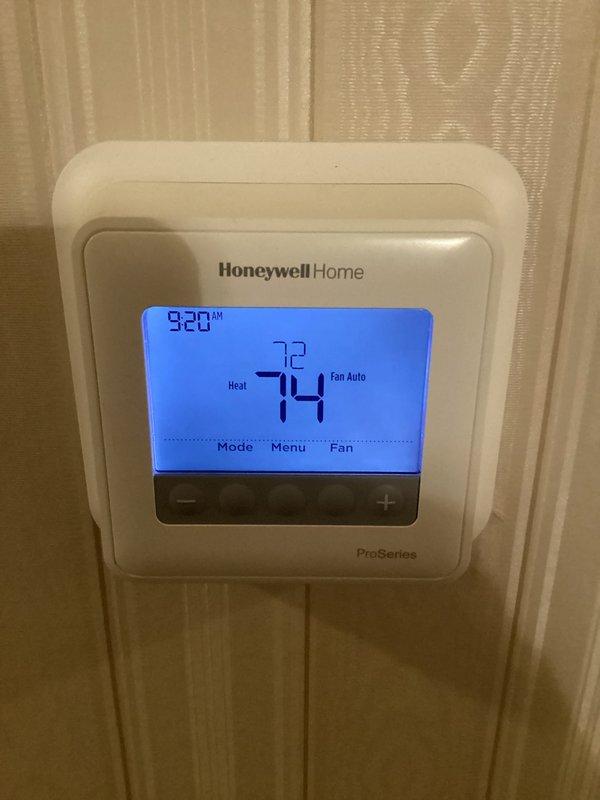 Completed planned maintenance service on 5-year-old HVAC system per Gold Level agreement. Replaced 16x20x5 filter, inspected thermostat operation (Honeywell ProSeries) confirming proper heat mode functionality with temperature settings at 72°F current/74°F target. Performed electrical diagnostics with multimeter showing 344V reading at terminal connections. This was the customer's second maintenance visit as part of their renewal service.