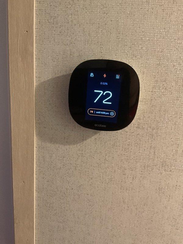 Responded to customer complaint regarding low voltage error on EcoBee thermostat and no heat production. Diagnostic testing revealed functioning thermostat (showing 72°F with 52% battery) and confirmed warm air supply using Fieldpiece temperature probe. Verified system operation was within normal parameters and educated customer on proper thermostat operation.