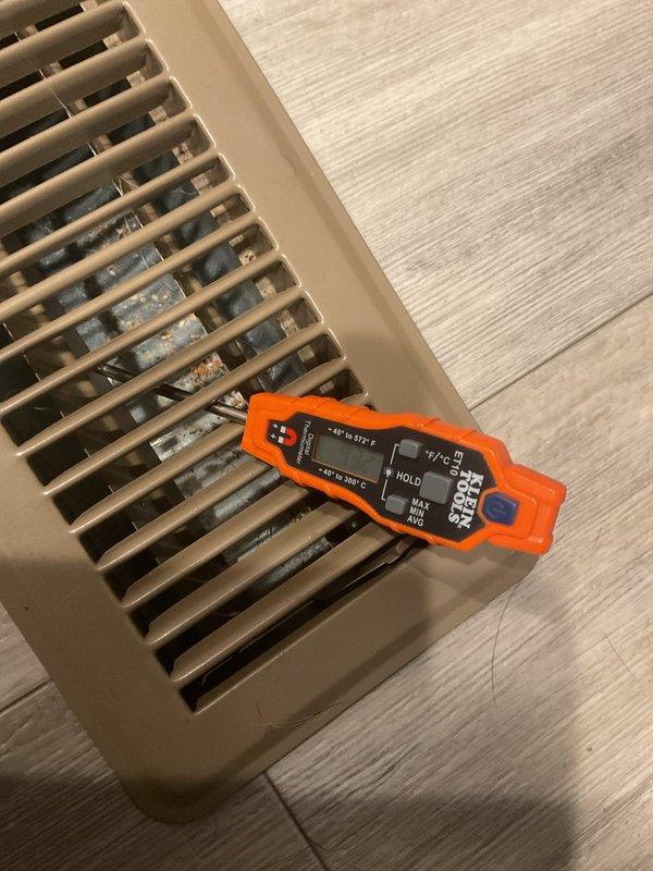 Responded to customer complaint regarding low voltage error on EcoBee thermostat and no heat production. Diagnostic testing revealed functioning thermostat (showing 72°F with 52% battery) and confirmed warm air supply using Fieldpiece temperature probe. Verified system operation was within normal parameters and educated customer on proper thermostat operation.