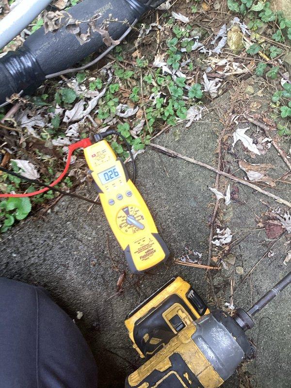 Performed scheduled monthly maintenance on 20x20x4 air conditioning system (approximately 1 year old). Conducted electrical diagnostics using multimeter (reading 026). Inspected outdoor condenser unit, which appears to be properly installed on pad with appropriate electrical connections and line set insulation intact. System operating within normal parameters.