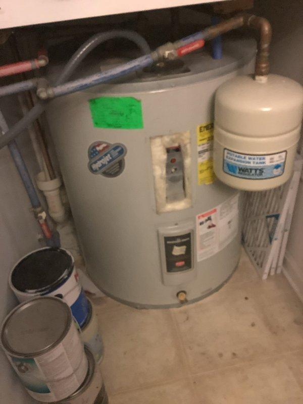 Conducted comprehensive estimate for replacement of 47-gallon electric tank water heater system. Evaluated current installation with expansion tank and existing plumbing connections. Assessed space constraints in utility closet and documented all components including piping configuration for accurate quote preparation.