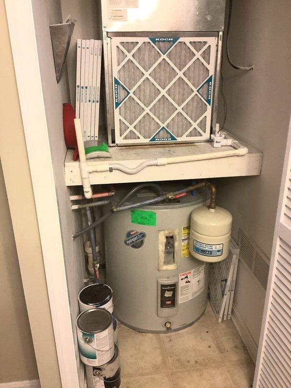 Conducted comprehensive estimate for replacement of 47-gallon electric tank water heater system. Evaluated current installation with expansion tank and existing plumbing connections. Assessed space constraints in utility closet and documented all components including piping configuration for accurate quote preparation.
