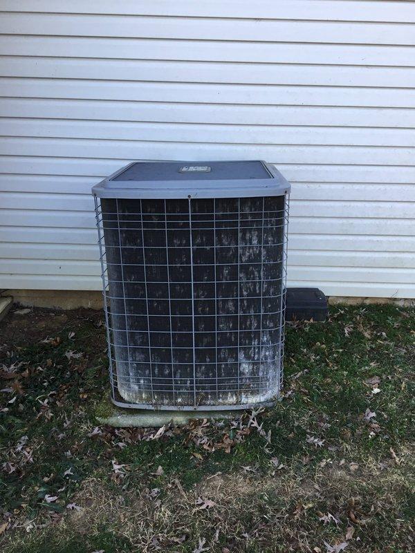 Diagnosed 20-year-old HVAC system that was shutting down intermittently before reaching set temperature. Inspection revealed significant dirt and debris buildup on outdoor condenser unit affecting system performance. Performed thorough cleaning of components, replaced non-functional thermostat on upper floor, and verified proper operation through complete system test cycle.