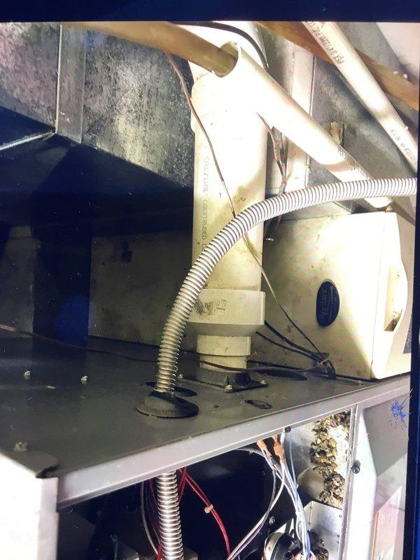 Diagnosed 20-year-old HVAC system that was shutting down intermittently before reaching set temperature. Inspection revealed significant dirt and debris buildup on outdoor condenser unit affecting system performance. Performed thorough cleaning of components, replaced non-functional thermostat on upper floor, and verified proper operation through complete system test cycle.