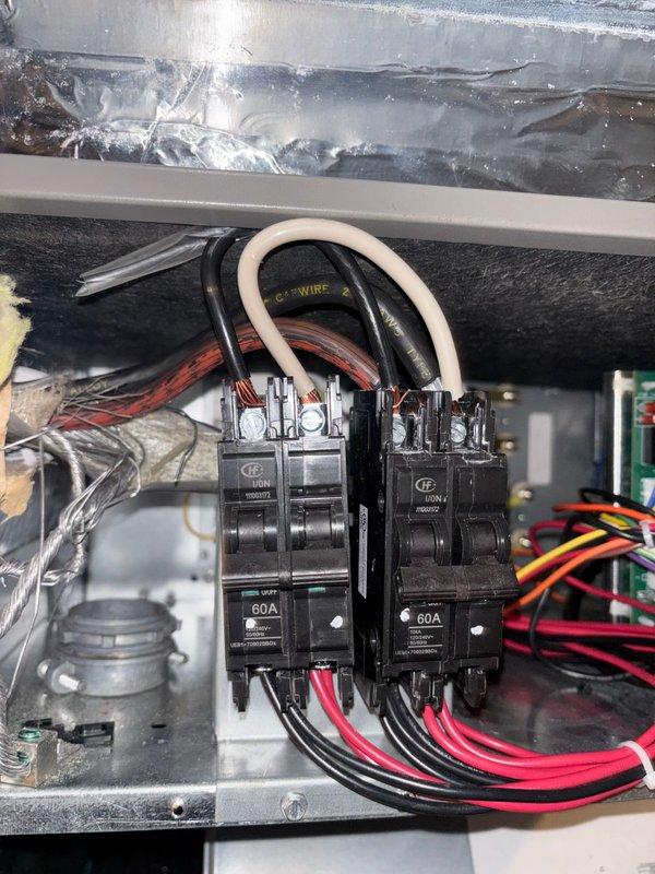 Heat strip circuit breaker malfunction diagnosed during service call. Temperature readings verified system operation at 37.7°F using UEi measurement device. Replacement breaker for heat strip has been ordered and will be installed upon arrival.