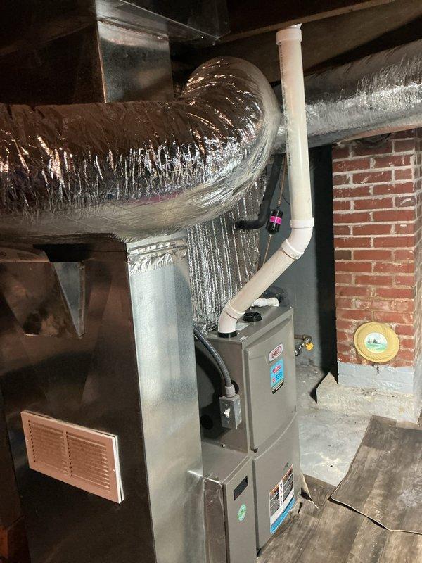 Completed annual platinum maintenance on 2-year-old system (2nd visit, renewal completed). Performed temperature testing at supply registers with readings of 106.8°F. Inspected furnace and ductwork, confirming proper insulation on circular ducts and PVC venting. Replaced 16x25x4 filter and verified system operation within manufacturer specifications.