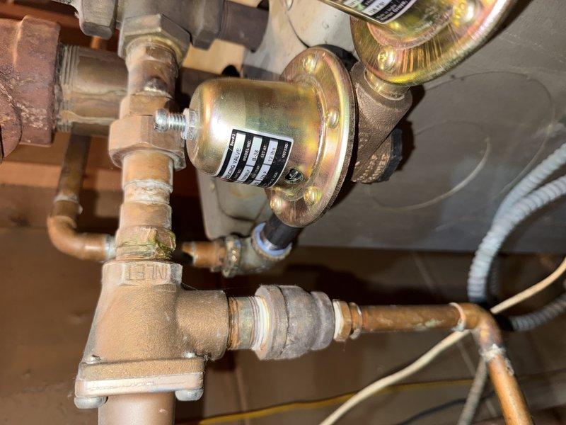 Completed follow-up service call to replace previously ordered pressure relief valve. Installed new valve on copper distribution system that showed significant oxidation. Also replaced failing circulator pump that had locked up due to oil leakage from the bottom with the new pump and motor that were on-site.