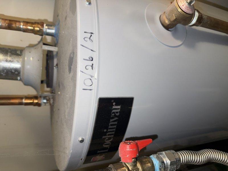 Responded to service call for non-functioning water heater (Lochinvar model, installed 2017). Performed diagnostic inspection identifying issues with electrical junction box showing signs of corrosion and improperly exposed wiring. Repaired electrical connections and verified proper operation of water heater system including associated plumbing components.