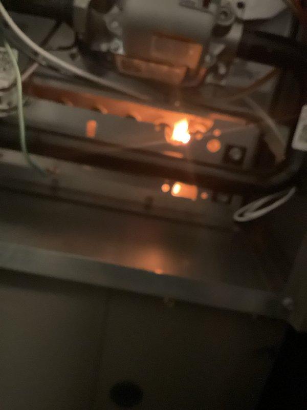 Performed annual platinum-level maintenance on HVAC system, including inspection and cleaning of the 16x20x4 filter system. Inspected burner assembly with visible blue flames indicating proper combustion. Addressed customer concern regarding kitchen vent airflow issue by checking and renewing the vent connection. All systems operating within normal parameters upon completion.