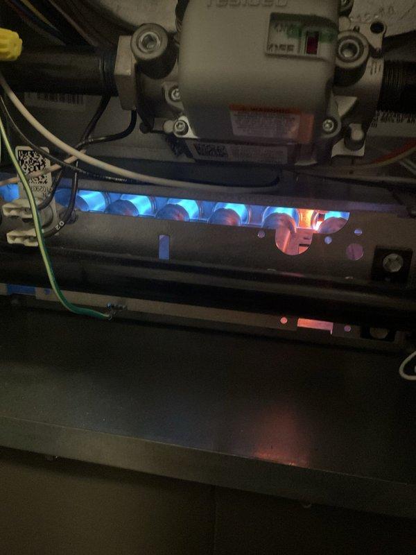 Performed annual platinum-level maintenance on HVAC system, including inspection and cleaning of the 16x20x4 filter system. Inspected burner assembly with visible blue flames indicating proper combustion. Addressed customer concern regarding kitchen vent airflow issue by checking and renewing the vent connection. All systems operating within normal parameters upon completion.