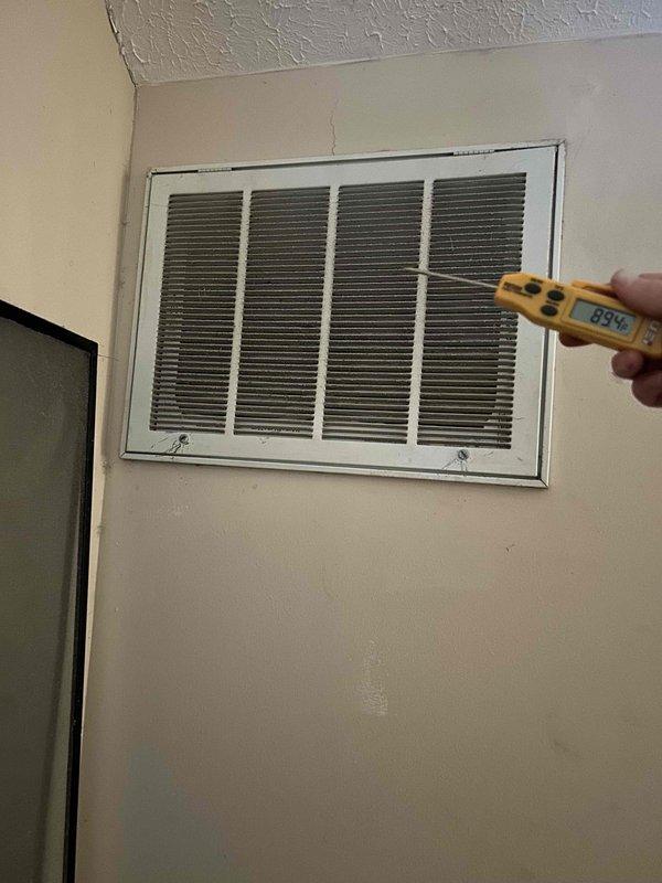 Responded to a follow-up service call where customer reported system not turning on. Upon investigation, found temperature at 73°F with measured supply air temperature of 89.4°F. Identified significant dust buildup in multiple vents causing airflow restriction. Removed and cleaned all registers across 5 runs (6-inch each). System was operating correctly with proper gas pressure (1.78) and igniter reading (54). Previously replaced control board that was sending incorrect signals to limit switches and cleaned flame sensor. Recommended polarized filter installation due to excessive dust issues in the home.