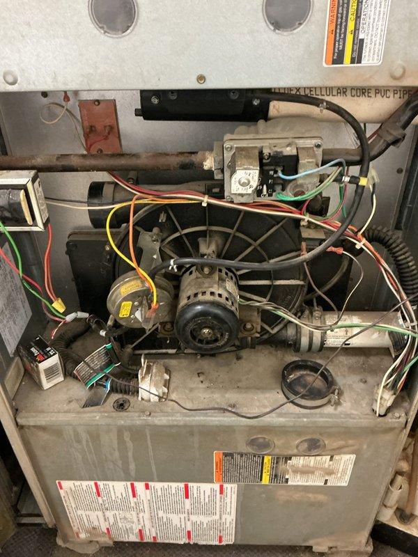 Inspected dual system no-heat complaint on 10-15 year old and 20+ year old furnaces. Diagnosed failed ignitor on primary system and pressure switch malfunction on secondary unit. Replaced worn ignitor assembly and cleaned pressure switch ports to restore proper operation on both units. Verified consistent airflow and complete heating cycle on both systems before concluding service.