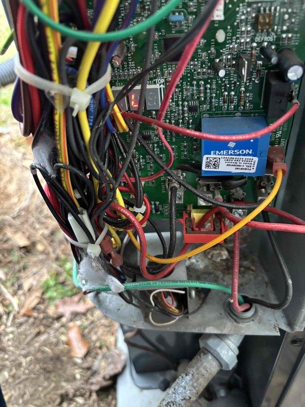 Diagnosed 5-year-old HVAC system with no airflow and complete system failure despite intact breakers. Inspected electrical components including JARD capacitor and Emerson control board, finding faulty relay switch causing communication failure between thermostat and unit. Replaced relay switch, restored proper circuit communication, and verified system operation with normal airflow restored.