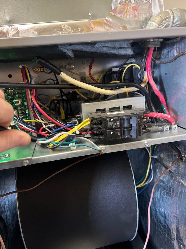 Conducted follow-up service to address previously incomplete work. Performed electrical diagnostics using Fluke 324 clamp meter on control panel, confirming 227V reading with proper circuit operation indicated by green LED status light. Inspected and verified replacement heat kit installation per prior service notes.