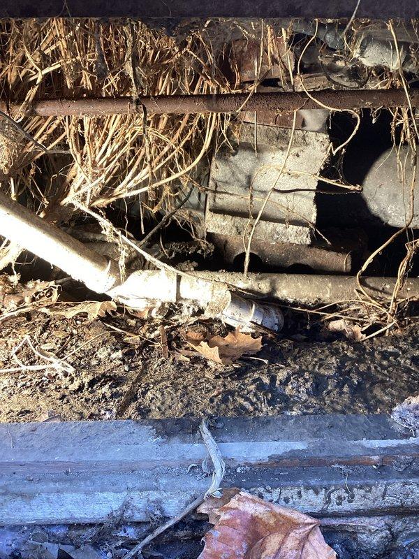 Responded to service call for water in crawl space. Upon inspection, discovered crawl space contained significant accumulation of nesting materials and debris around plumbing infrastructure. Evaluated moisture issues and assessed potential need for sump pump installation to address ongoing water intrusion.
