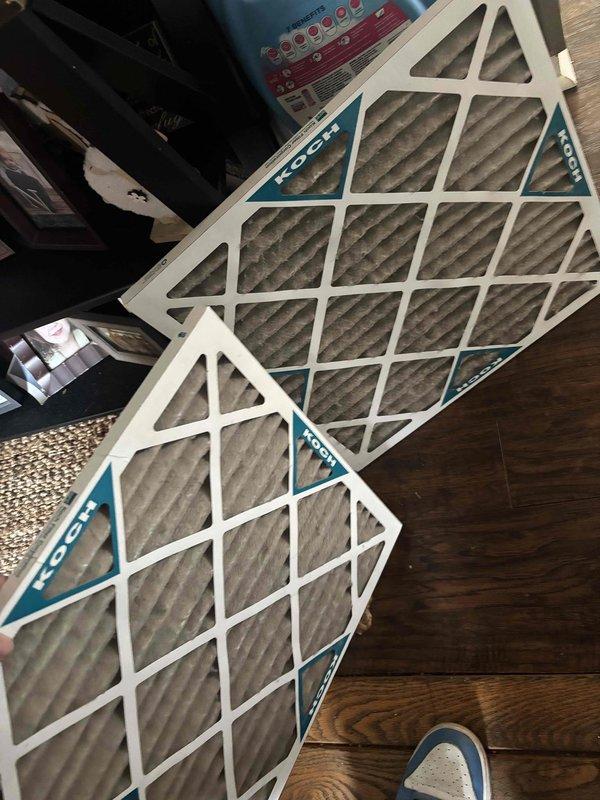 Completed Platinum Level annual maintenance service on a 6-year-old HVAC system. Replaced two 20"x20"x1" Koch air filters in ceiling-mounted return air grilles, ensuring proper airflow and system efficiency.