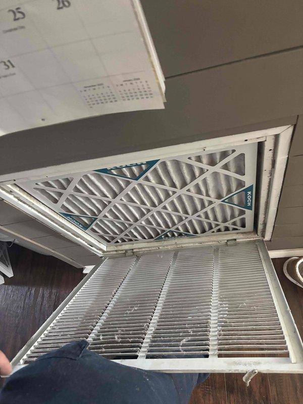Completed Platinum Level annual maintenance service on a 6-year-old HVAC system. Replaced two 20"x20"x1" Koch air filters in ceiling-mounted return air grilles, ensuring proper airflow and system efficiency.