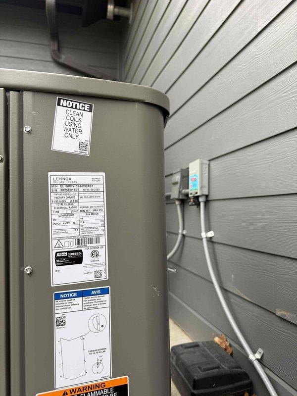 Completed installation of a 2-ton Lennox heat pump system with matching air handler for customer Chandler. Installed outdoor heat pump unit on concrete pad with proper electrical connections and verified system labels and warnings were intact. Job was sold by Jake.