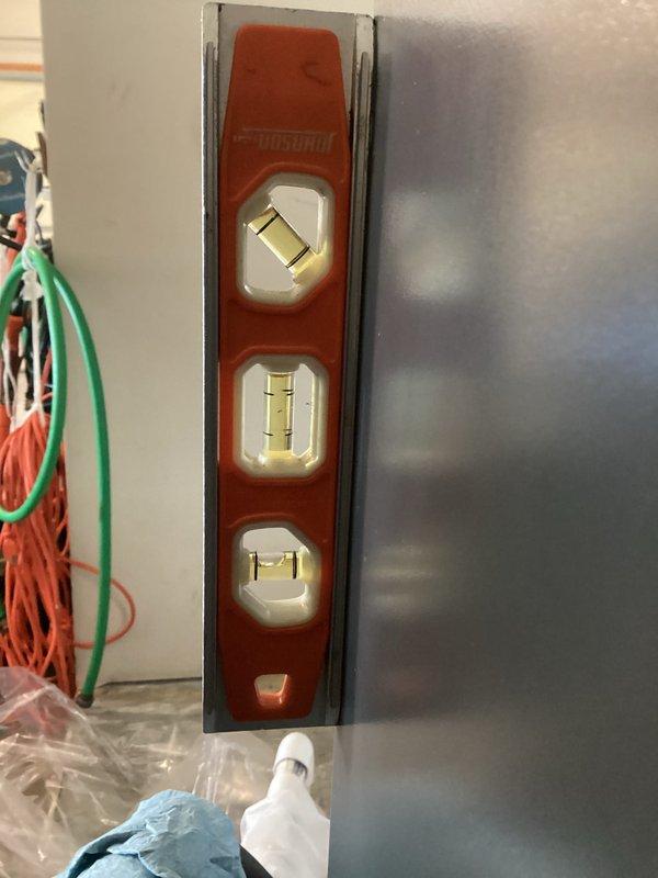 Completed annual planned maintenance on 10-year-old HVAC system. Verified thermostat functionality and system settings, with particular attention to temperature control parameters. Confirmed equipment levelness using spirit level to ensure proper condensate drainage and optimal operation.