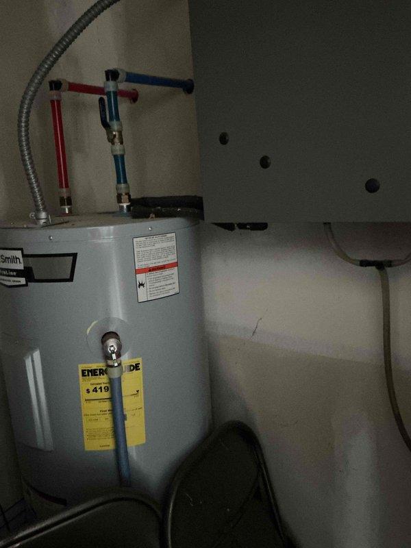 Responded to service call regarding a hissing noise from master bathroom shower head area. Upon inspection, discovered issue related to water heater connections. Verified the integrity of plumbing system including hot and cold water lines, pressure relief valve, and ventilation components. Made necessary adjustments to eliminate the noise and ensure proper operation of the water heating system.