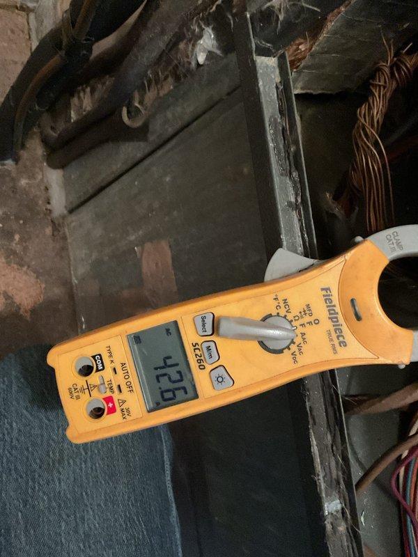 Performed annual maintenance on 17-year-old system (2nd visit of Platinum plan). Replaced 20x25x5 filter and conducted electrical diagnostics showing 42.6 amp reading on compressor. Inspected wiring connections at control board, confirming proper terminal connections. Customer renewed service agreement.