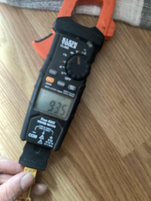 Performed scheduled maintenance on 5-year-old HVAC system (20x20x5) during second maintenance visit. Inspected interior electrical components including control board and wiring. Conducted electrical testing with clamp meter, measuring running amperage at 9.35A, which is within manufacturer specifications. System operating normally with no immediate concerns identified.