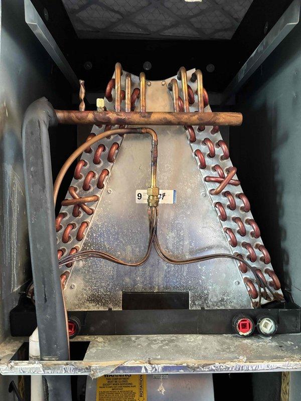 Performed monthly maintenance service on 3-year-old HVAC system per Platinum Level agreement. Inspected evaporator coil assembly which showed normal dust accumulation. Discovered significant wall damage with possible mold growth near the air handler and replaced the 20x20x5 filter. Recommended professional remediation for the wall damage and mold issue to prevent system contamination and ensure proper airflow.
