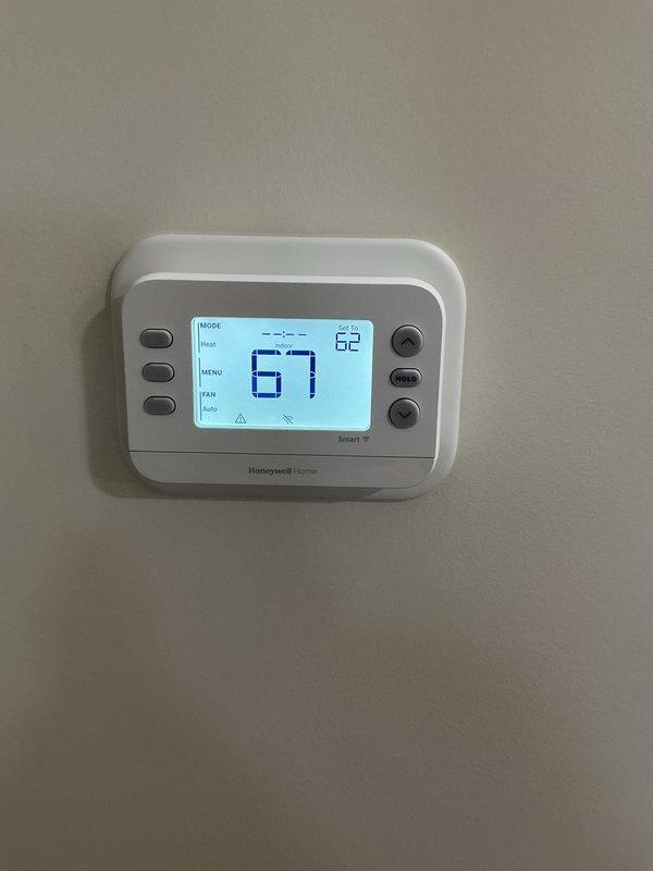 Completed annual maintenance on Platinum Level HVAC system (7-8 months old) during initial system startup. Verified proper system operation with temperature readings showing 69.9°F at register and confirmed thermostat functionality with current temperature at 67°F (setpoint 82°F). All maintenance performed according to manufacturer specifications for new installation.