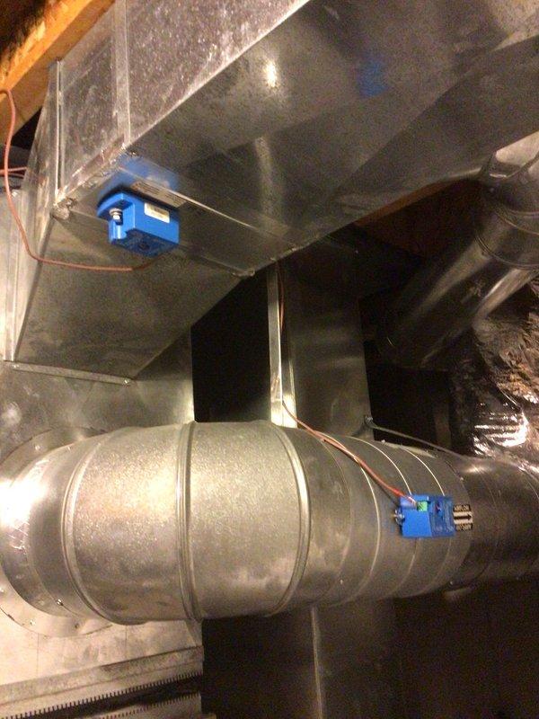 Completed annual Gold Level maintenance on 13-year-old HVAC system. Inspected ductwork connections, control devices, and associated plumbing components in utility space. Verified proper installation of sensors and monitoring equipment on both cylindrical and rectangular ducts, with all connections secure and functioning normally.