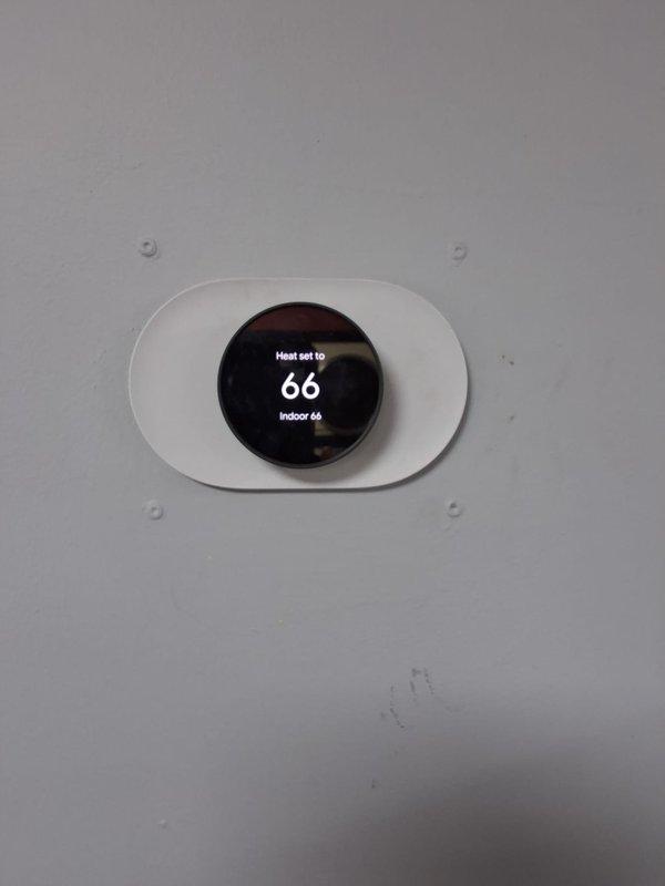 Responded to service call for a 1-year-old electric heating system not responding to heat commands. Diagnosed thermostat malfunction causing incorrect temperature readings and failure to initiate heating cycle. Replaced defective thermostat and verified proper system operation with successful heat call response.