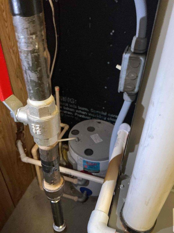 Performed a comprehensive flush on a tanked water heater system to remove sediment buildup. Inspected all plumbing connections, including PVC pipes and brass fittings, ensuring proper sealing at junction points. System was returned to full operational status with improved efficiency and extended equipment lifespan.