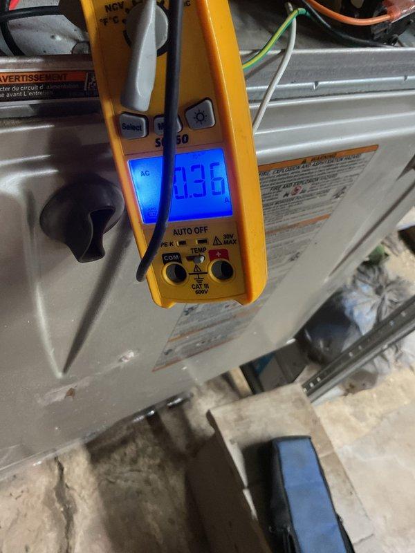 Performed annual maintenance on 12-year-old HVAC system as requested. Inspected mechanical components including gear assembly and linkage system. Conducted electrical diagnostics with multimeter, recording AC voltage measurement of 0.36V at equipment housing. Replaced standard 16x25x4+1" filter as part of scheduled service.