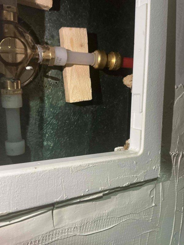 Responded to follow-up call regarding persistent hissing sound from master bath shower. Inspected valve assembly through access panel and confirmed diagnosis from previous visit. Replaced faulty cartridge in valve body which was causing the noise issue, as the original assessment had indicated no leaks within the wall cavity.