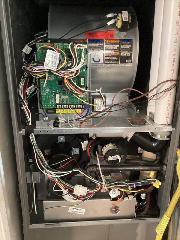 Performed diagnostic assessment on customer's fully modulating HVAC system that was reported to short-cycle and inadequately remove humidity. Conducted pressure testing with dual port manometer (readings: 193/-194) and inspected control board connections. Reattached fallen return air duct in attic and verified proper system operation after adjustments.