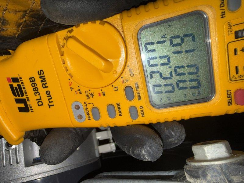 Attempted scheduled maintenance on 1-year-old CFI system but customer was not present. Used UEi DL389B True RMS multimeter to perform preliminary electrical diagnostics before discovering customer unavailability. Left message for customer to reschedule second maintenance visit.