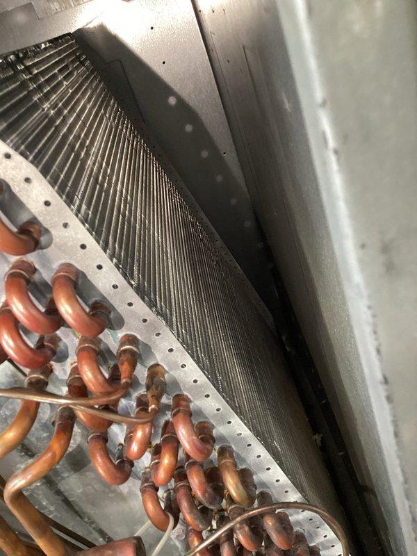 Performed scheduled platinum level maintenance on 1-year-old HVAC system, replacing 20x20x5 filter as per maintenance agreement. Conducted electrical diagnostic testing with clamp meter, recording 21.8A current draw within manufacturer specifications. Inspected copper coils and evaporator assembly, which showed normal operational condition with no significant degradation or airflow restrictions.