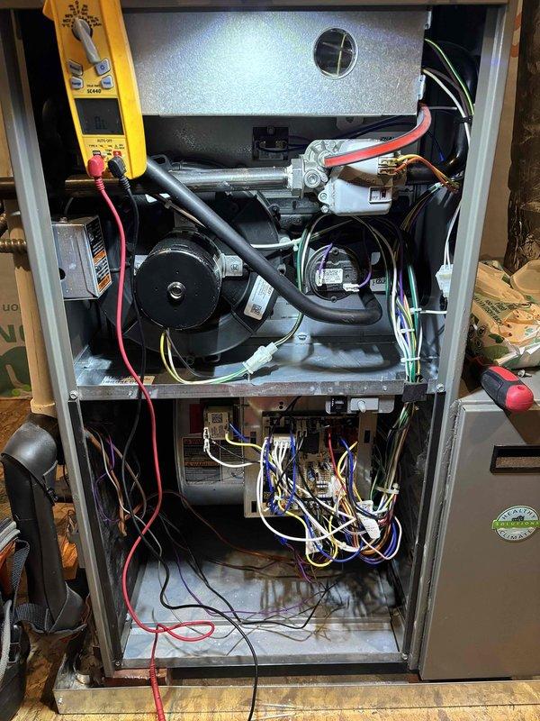 Performed scheduled annual maintenance on 2-year-old dual HVAC system. Accessed interior components of furnace unit to inspect electrical connections and blower assembly. Replaced 20x25x5 (downstairs) and 16x25x5 (upstairs) air filters during service to maintain system efficiency and air quality.