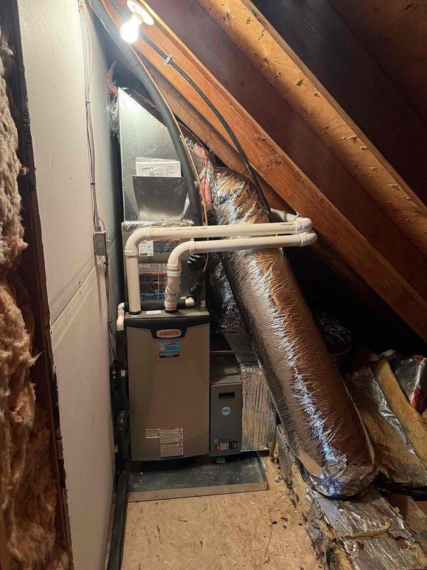 Completed installation of a new 2-ton Lennox 2-stage complete HVAC system on the second floor. System features 17 SEER cooling and 97% efficient heating components. Properly mounted furnace unit on platform with PVC ventilation system and installed insulated ductwork with reflective metallic wrapping for optimal efficiency. All connections secured and system tested for proper operation.