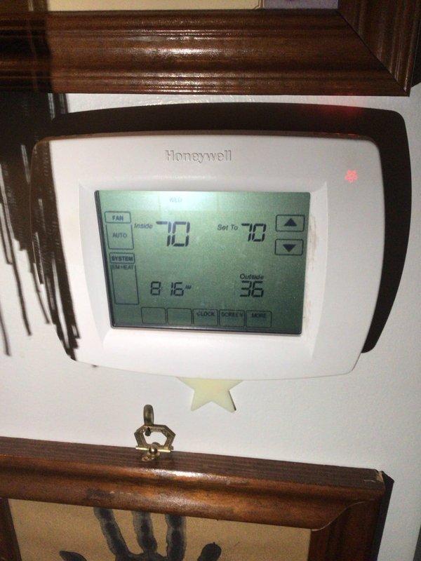 Performed routine furnace maintenance as scheduled with customer's requested technician Francis. Inspected 13-year-old system with 16x25x5 filter. Verified proper thermostat operation (Honeywell digital) showing appropriate temperature readings and system response in heating mode.