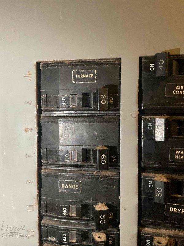 Performed comprehensive assessment of 50-year-old HVAC system for potential replacement. Inspected existing thermostat wiring configuration, documenting connection points and wire placement. Evaluated electrical panel to confirm adequate power supply for new system installation, noting the existing 60-amp furnace circuit and air conditioning connections. Customer expressed interest in tankless water heater promotion and indicated financing would be required for the project.
