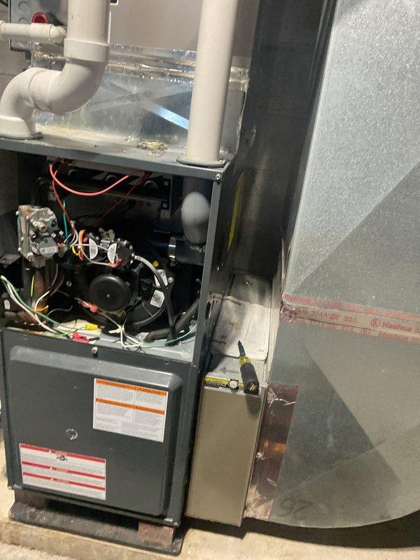Responded to no heat call for 6-year-old system with downstairs unit not producing airflow. Upon inspection of the furnace, found faulty control board causing system failure. Replaced control board, verified proper operation of blower motor and heating components, and confirmed system now maintaining proper temperature differential between thermostat setting and ambient temperature.