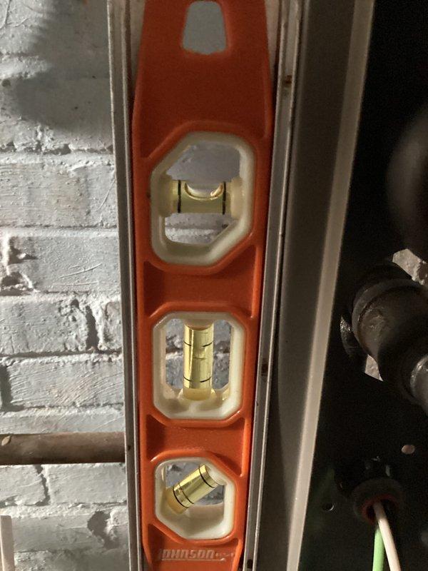 Completed 6-month scheduled maintenance visit. Replaced 20X25X5 air filter and verified system operation. Temperature readings indicated proper functionality at 58.8°F, and equipment was confirmed level using spirit level to ensure optimal performance.