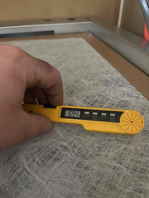 Completed installation of air handler in residential closet space. Performed comprehensive testing with digital measurement device, obtaining readings of 694 on filter media. All electrical connections were properly secured with proper wire routing along the wall structure.
