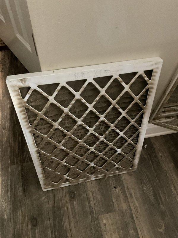 Responded to no-heat call for aging system (10+ years). Diagnostic inspection revealed severely clogged air filter with significant dust and debris accumulation, restricting proper airflow. Removed and replaced filter to restore system efficiency and proper heating function.
